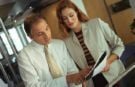 Business partners reviewing documents